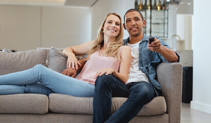 Mature couple, living room and watching tv, news and movie, cable show or media broadcast on sofa...