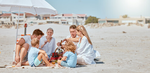 Beach, umbrella and happy family relax on vacation, summer travel and tropical holiday in sunshine. Big family, ocean and sea sand for calm, peace and love, care and quality time together on picnic
