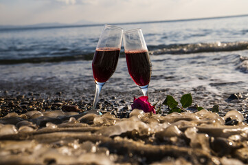 two glasses on the seashore
