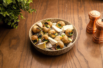 Snails with garlic butter and cheese