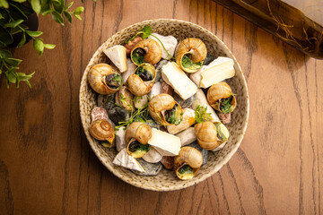 Snails with garlic butter and cheese