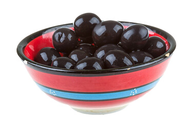 Olives black watered with olive oil in a bowl isolated on a white background