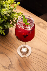 Blackcurrant cocktail with mint