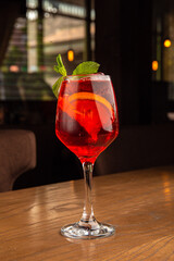 Cocktail with orange and mint