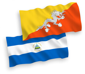 Fototapeta premium Flags of Nicaragua and Kingdom of Bhutan on a white background