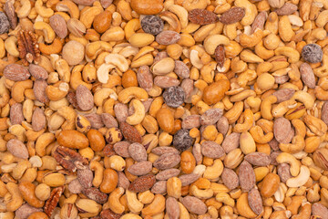 A group of almonds, pistachios, walnuts, macadamia, cashews.