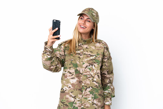 Military woman isolated on white background making a selfie