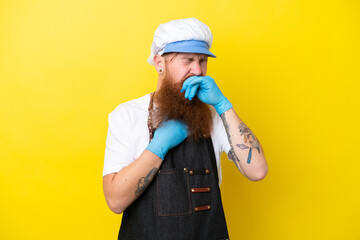 Fishmonger wearing an apron isolated on yellow background is suffering with cough and feeling bad