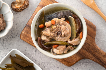 Delicious Taiwanese peeled green chili pepper chicken soup with mushroom and goji berry.