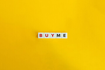 Buy Me. Block Letter Tiles on Yellow Background. Minimal Aesthetics.