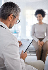 Doctor, consultation and writing on clipboard with patient in hospital office for symptoms, records or notes. Healthcare, wellness or black woman consulting medical physician with checklist in clinic
