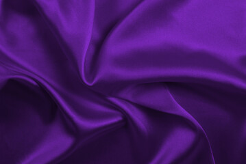 Rich and luxury red silk fabric texture background.