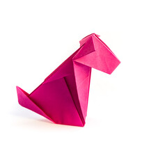 Pink paper dog origami isolated on a white background