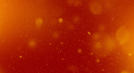Fire particles on red background