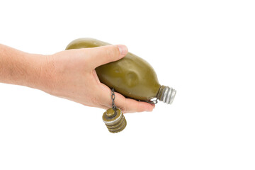 Military metal flask in a hand.