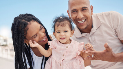 Happy family, mother and father with a baby at a beach for summer holiday, vacation or weekend in Rio de Janeiro. Relaxing, mom and lovely dad smiles enjoying fun quality time with newborn in Brazil