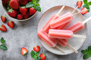 Strawberry ice cream popsicles