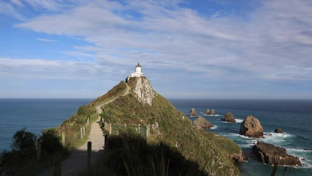 Lighthouse on Nugget Point. It is located in the Catlins area on the Southern Coast of New Zealand