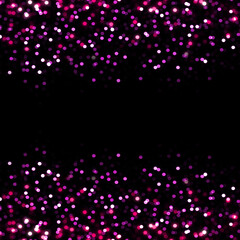 Pink abstract bokeh covered with blurred shiny particles on top side as decorative cover on black background