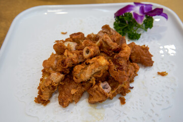 A delicious Chinese dish, fried pig small intestines