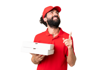 Pizza delivery man with work uniform picking up pizza boxes over isolated chroma key background pointing up a great idea