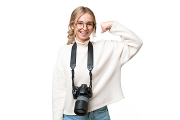 Young photographer English woman over isolated background doing strong gesture