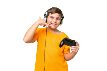 Little caucasian kid playing with a video game controller over isolated chroma key background making phone gesture. Call me back sign