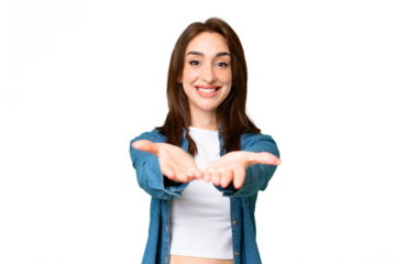 Young caucasian woman over isolated chroma key background holding copyspace imaginary on the palm to insert an ad