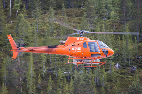 Sogndal, Norway - June 16, 2022: A Ecureuil helicopter of company Nord Helicopter departing Sogndal airport in Norway for a rescue flight
