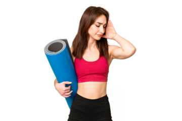 Young sport caucasian woman going to yoga classes while holding a mat over isolated chroma key background with headache