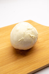 Mozzarella cheese on a board