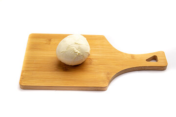Mozzarella cheese on a board