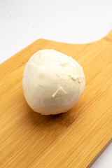 Mozzarella cheese on a board