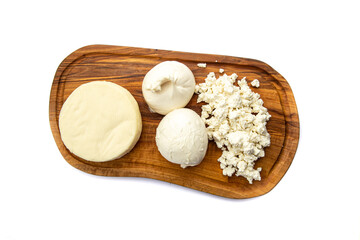 Assorted cheeses on a board 