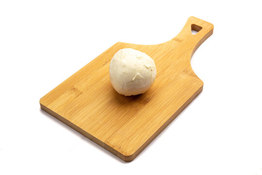Mozzarella cheese on a board