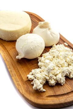 Assorted cheeses on a board 