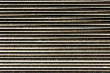 Metal stripes pattern. Ventilation grille texture. Industrial iron metal bars. Grunge grid lines....