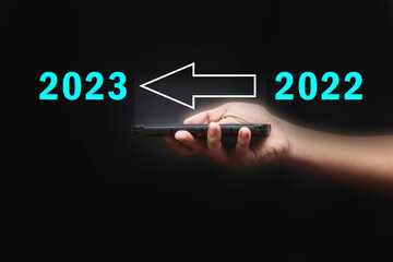 The virtual download bar with loading progress bar for New Year's  and changing the year 2022 to 2023
