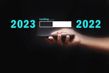 The virtual download bar with loading progress bar for New Year's  and changing the year 2022 to 2023