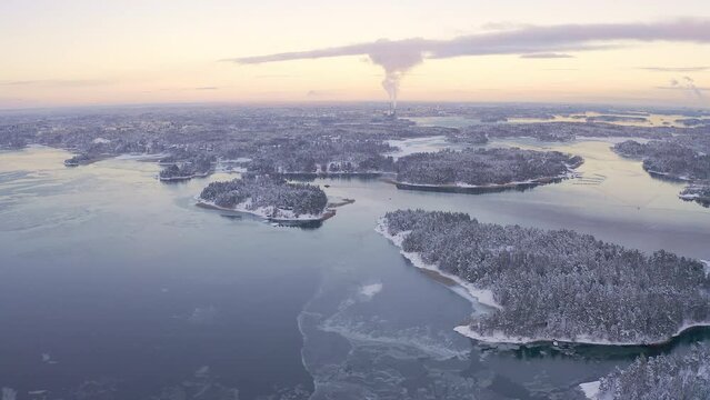 Soukka, Finland - 09.12.22:Flying over a freezing bay and winter archipelago. Finnish winter. Winter landscape. Scandinavia.