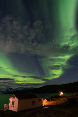 Northern lights above Seglvik, Troms, Norway with stars