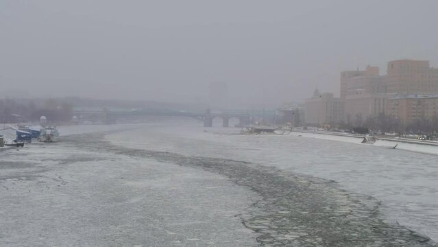 Moscow River and Frunzenskaya Embankment under the heavy snow. Moscow. Russia