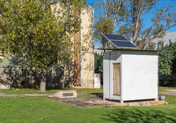 Modern rural hut with a solar panel