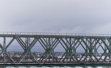 Old metal railway bridge with rust spots