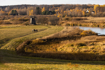 Autumn landscape with old wooden windmill. Mikhaylovskoye Museum Reserve, Pskov region, Russia