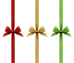 Red, golden and green bright colored ribbons bows isolated on transparent background, top view,...