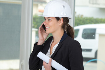 women engineers using smart phone