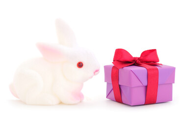 Gift boxes, gifts and toy hare on a white background isolated.