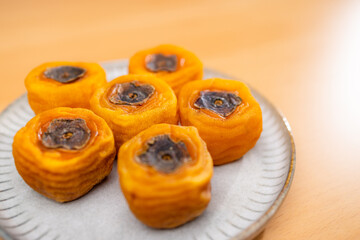 Dried persimmon on the plate