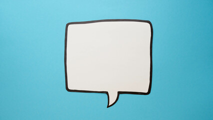 Fototapeta premium Speech bubble on a blue background. Comic cloud with a place for text